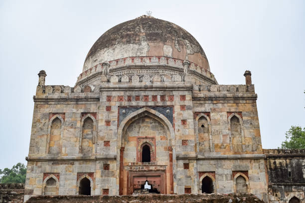 istock Mughal Architecture inside Lodhi Gardens, Delhi, India, Beautiful Architecture Inside the The Three-domed mosque in Lodhi Garden is said to be the Friday mosque for Friday prayer, Lodhi Garden Tomb 1412415171