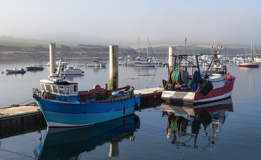 Lanildut, Brittany, France on 7/13/2022: fishing vessels at the harbor during early morning