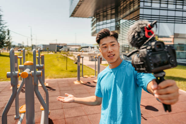 istock Young Man Vlogging His Workout In Outdoor Gym 1412419520