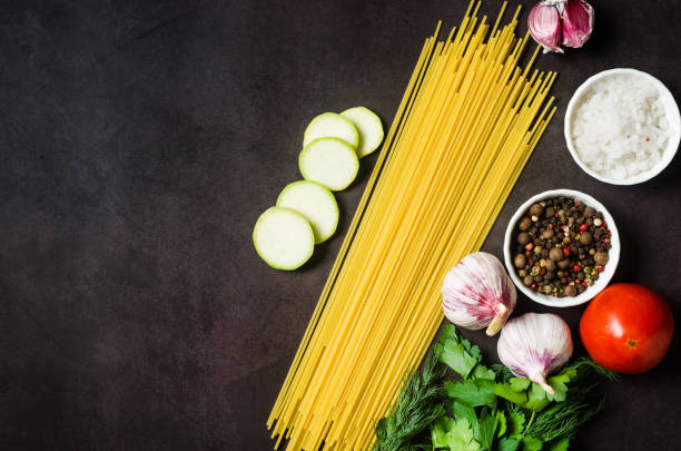 istock Spaghetti with marrow, tomatoes, garlic and parsley for cooking. 1412421205