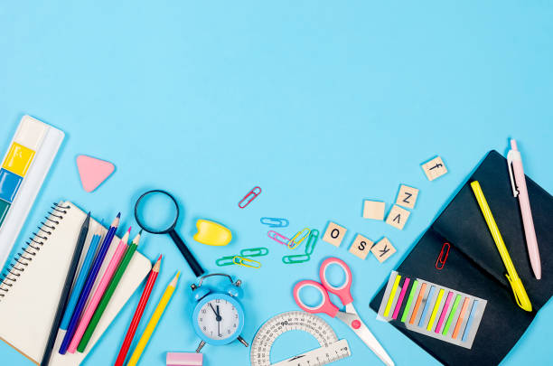 istock Flat lay composition with colorful school supplies on blue background. 1412421213