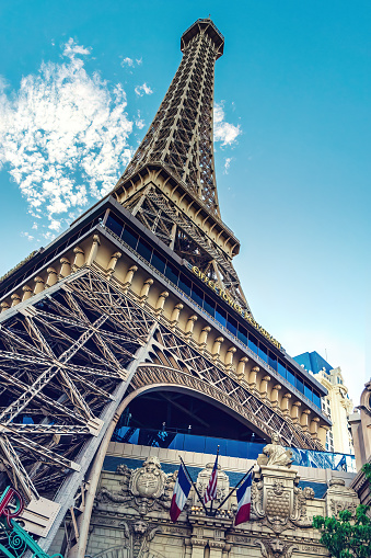 Beautiful cityscape urban street view of the Eiffel tower in Paris, France, on a spring day, seen from Trocadero square