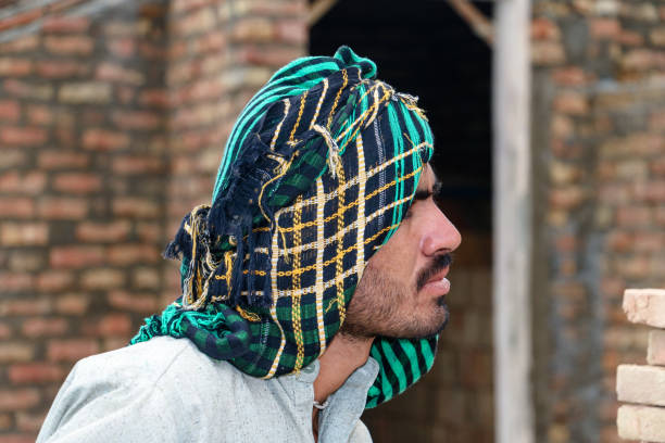 istock laborer looking to mason on construction site 1412424543