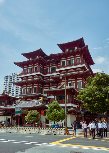 Singapore, Singapore - December 17 2018\nLarge traditional temple in the middle of Singapore in the mid afternoon on a warm humid day.