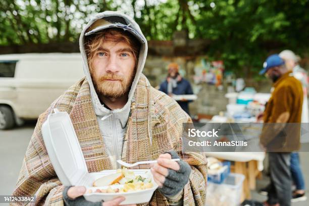 Homeless Man Eating Food Outdoors Stock Photo - Download Image Now - Homelessness, Homeless Person, Men