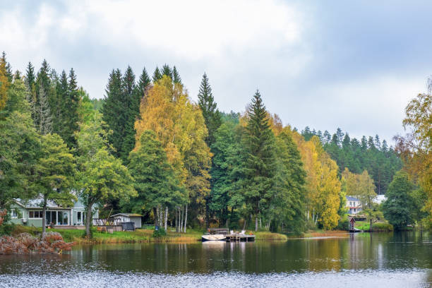 istock Cottages on a beach by a river 1412436756