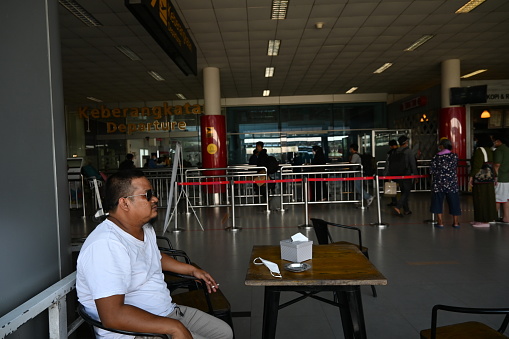 Pangkalpinang, Indonesia- June 12 2022: people in the Depati Amir airport lobby