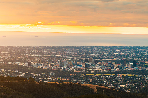 Adelaide city skyline at sunset viewed from the hills, South Australia