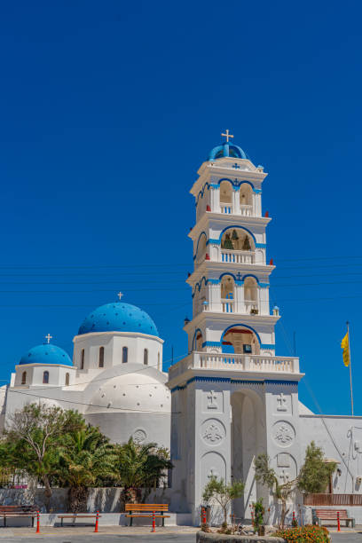 Greek church bell tower, Timiou Stavro, in Perissa, Santorini island, Greece. stock photo