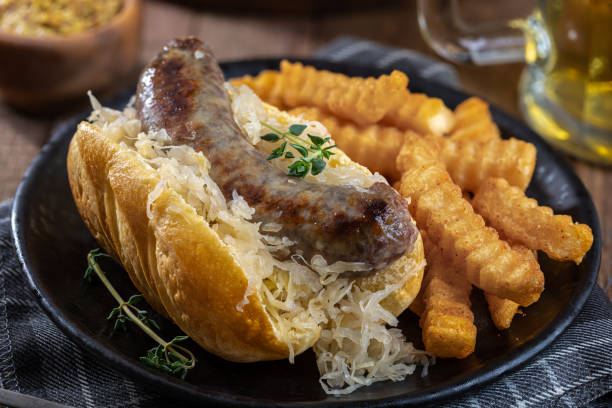 istock Grilled bratwurst and sauerkraut on a bun 1412441541
