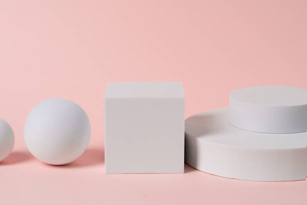 istock Geometrics white figures placed on light pink bakcground. 1412448054