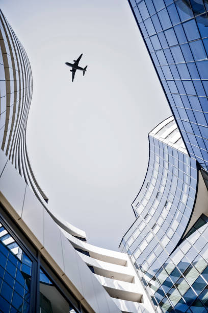 Plane flying over the skyscrapers
