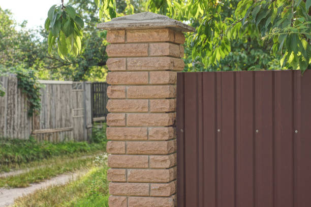 istock part of a private brown metal and brick wall 1412453089