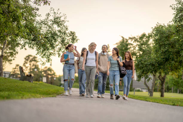 istock University Students Walking Outside on Campus 1412454799