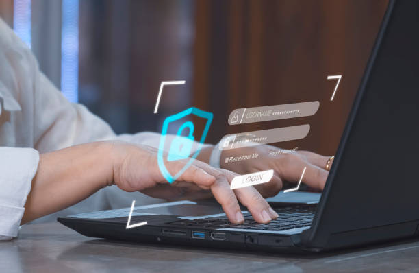 istock businesswoman using laptop with cybersecurity, login and user's personal encryption icon on modern virtual interface 1412454913