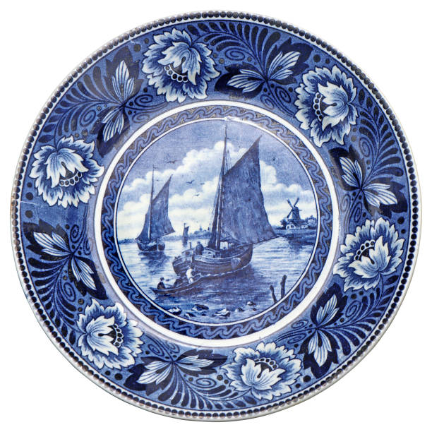 Old Blue and white ceramic plate with Dutch motifs as a souvenir Old Blue and white ceramic plate with Dutch motifs as a souvenir dutch baroque architecture stock pictures, royalty-free photos & images