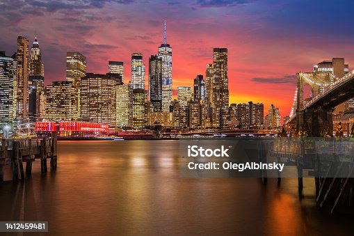 istock New York City Skyline with Brooklyn Bridge, Manhattan Financial District and World Trade Center with Dramatic Sunset Sky. 1412459481