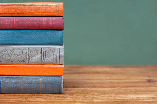 istock a stack of colorful books on a table close-up 1412459588