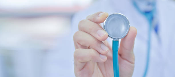 istock Close up hand holding stethoscope,Doctor stethoscope 1412460572