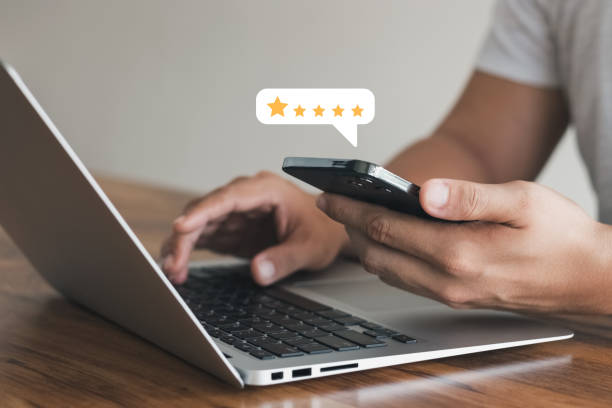 istock User give rating to service experience on online application, Customer review satisfaction feedback survey concept, Customer can evaluate quality of service leading to reputation ranking of business. 1412461558