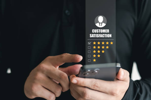 istock User give rating to service experience on online application, Customer review satisfaction feedback survey concept, Customer can evaluate quality of service leading to reputation ranking of business. 1412462699