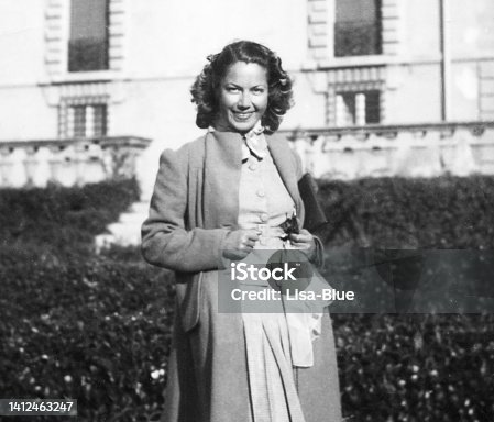 istock Young beautiful woman in 1939. 1412463247