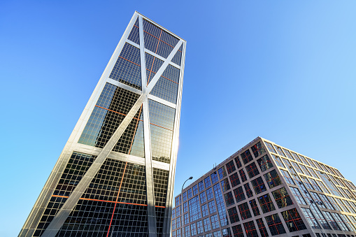 Tall glass and metal buildings in the financial center of the city of Madrid, Spain