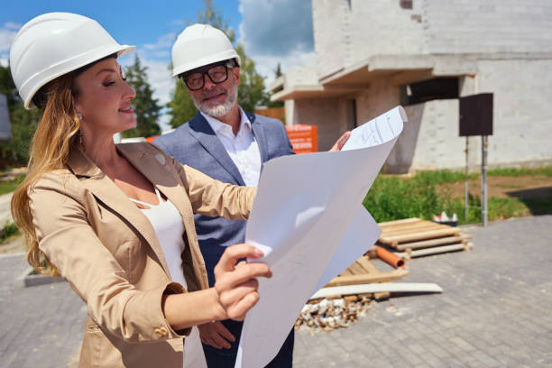 istock Real estate agent shows house project to client 1412475584