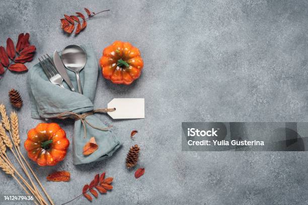 Thanksgiving Autumn Place Setting With Cutlery Decorative Pumpkins And Colorful Leaves Top View Flat Lay Copy Space Selective Focus Stock Photo - Download Image Now