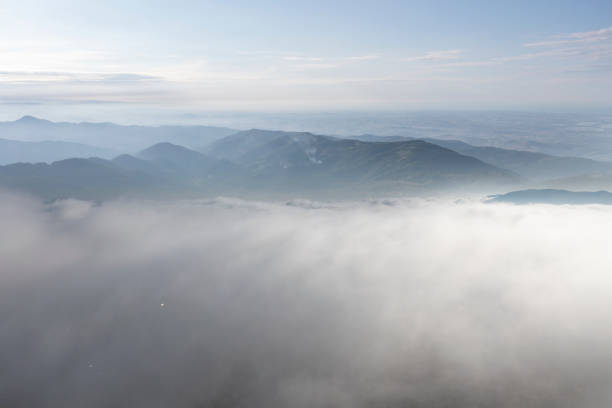 istock Aerial view of misty mountains at sunset. 1412483349