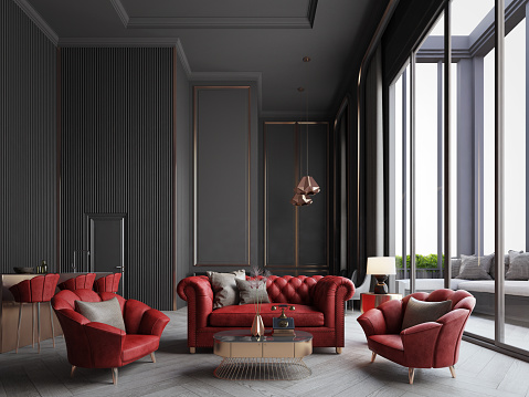 Modern classic interior with red sofa,armchairs,stools in dark room.3d rendering