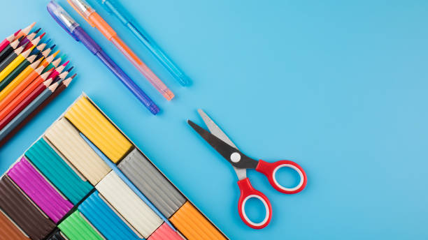 istock Stationery for creativity on a blue background. Back to school. Copy space. 1412486674