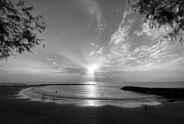 istock Sunset over a lagoon by the sea 1412488143
