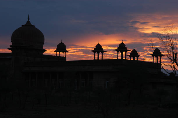 Silhouettes of the towers of a palace at sunset in Bikaner, Rajasthan, India