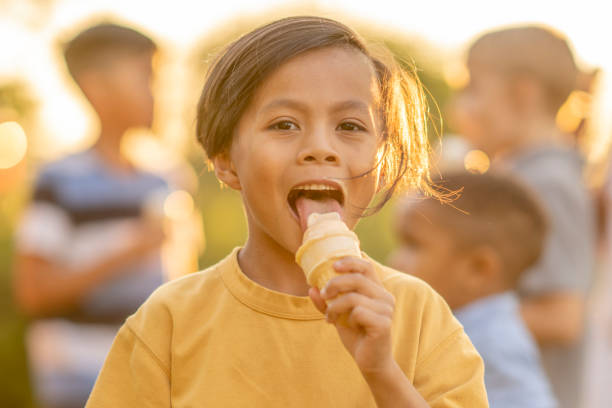 istock Asian Boy Enjoying Ice Cream 1412490405