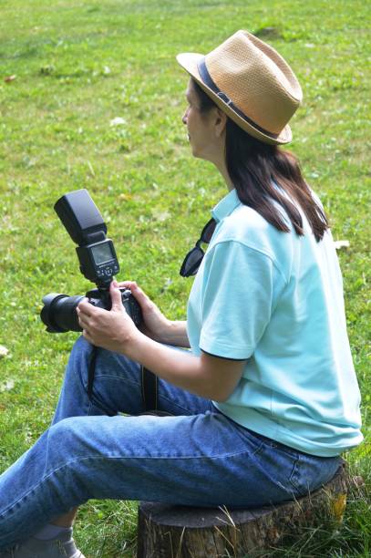istock girl with a camera 1412490806