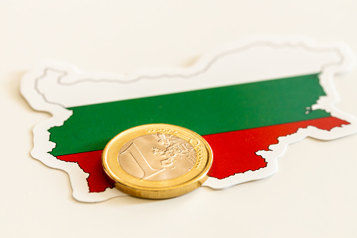 Flag of Bulgaria together with a 1 euro coin, Creative Conception of Bulgarians Joining the Euro Area, Adoption of European Union Currency in Their Country, Light Background