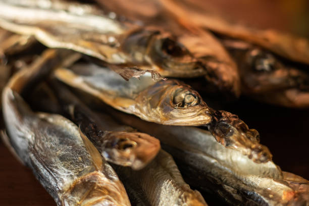 istock Dried fish to beer, selective focus close up 1412491693