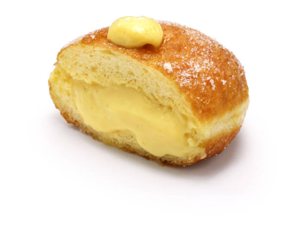 istock homemade Bomboloni filled with custard 1412493676