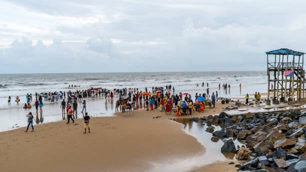 Mandarmani, Digha - 01 Aug 2022 - Tourists enjoying on the beach at Mandarmani, a seaside resort village