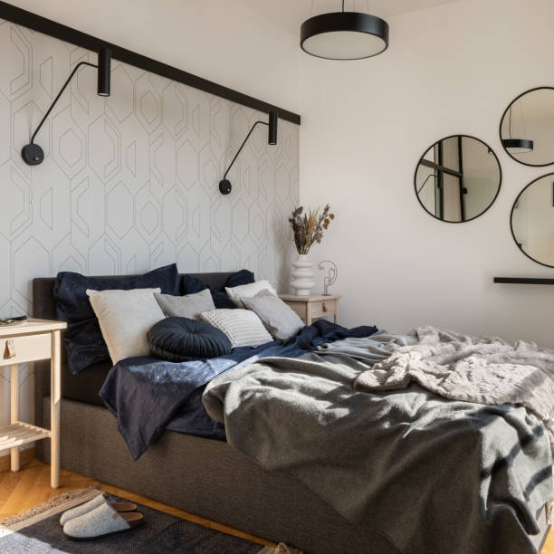 istock Big bed in stylish decorated bedroom 1412500267