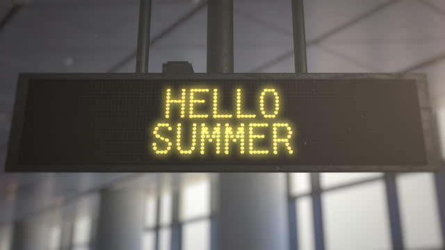 Hello Summer on information table of airport