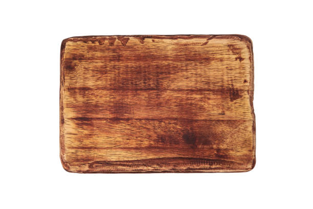 istock Dark wood plate isolated on white background 1412503345