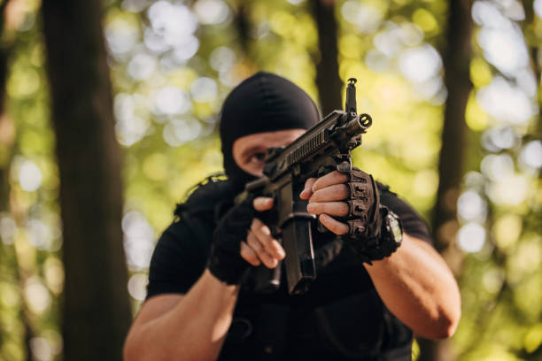 istock SWAT team soldier in action 1412504416