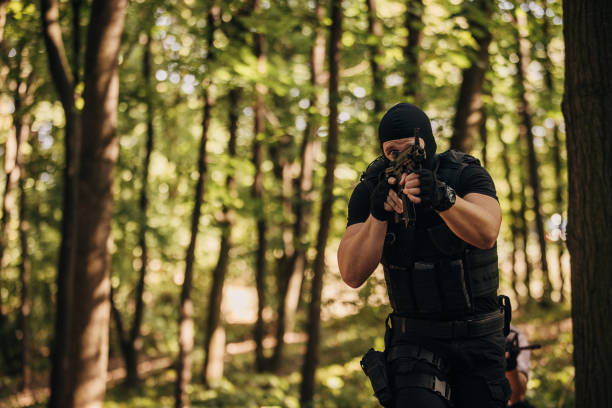 istock SWAT team soldier in action 1412504492