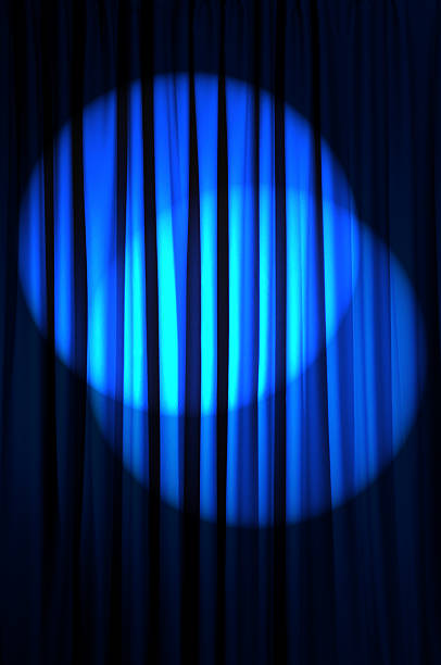 istock Brightly lit curtains in theatre concept 141250584