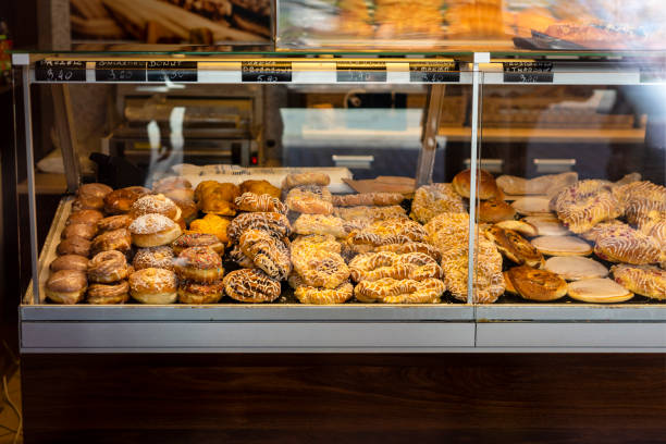 istock Bakery, shop display sugar bun, sweets, donuts. 1412508125