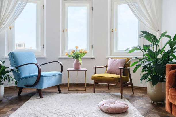 istock Two comfortable armchairs stand opposite each other, next to a coffee table 1412516990