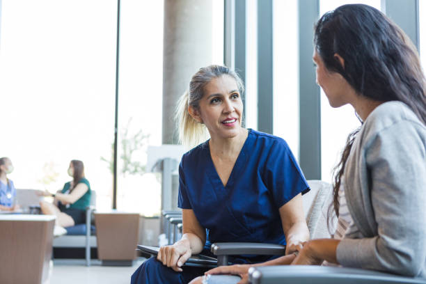 istock Nurse talks to patient 1412518747