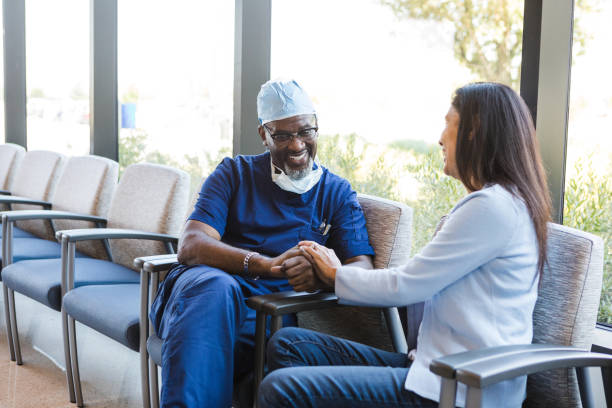 istock Female patient holds hands with the surgeon 1412518832